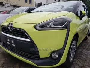 Toyota Sienta 1.5 AWD (6-Seater) 2015 Yellow