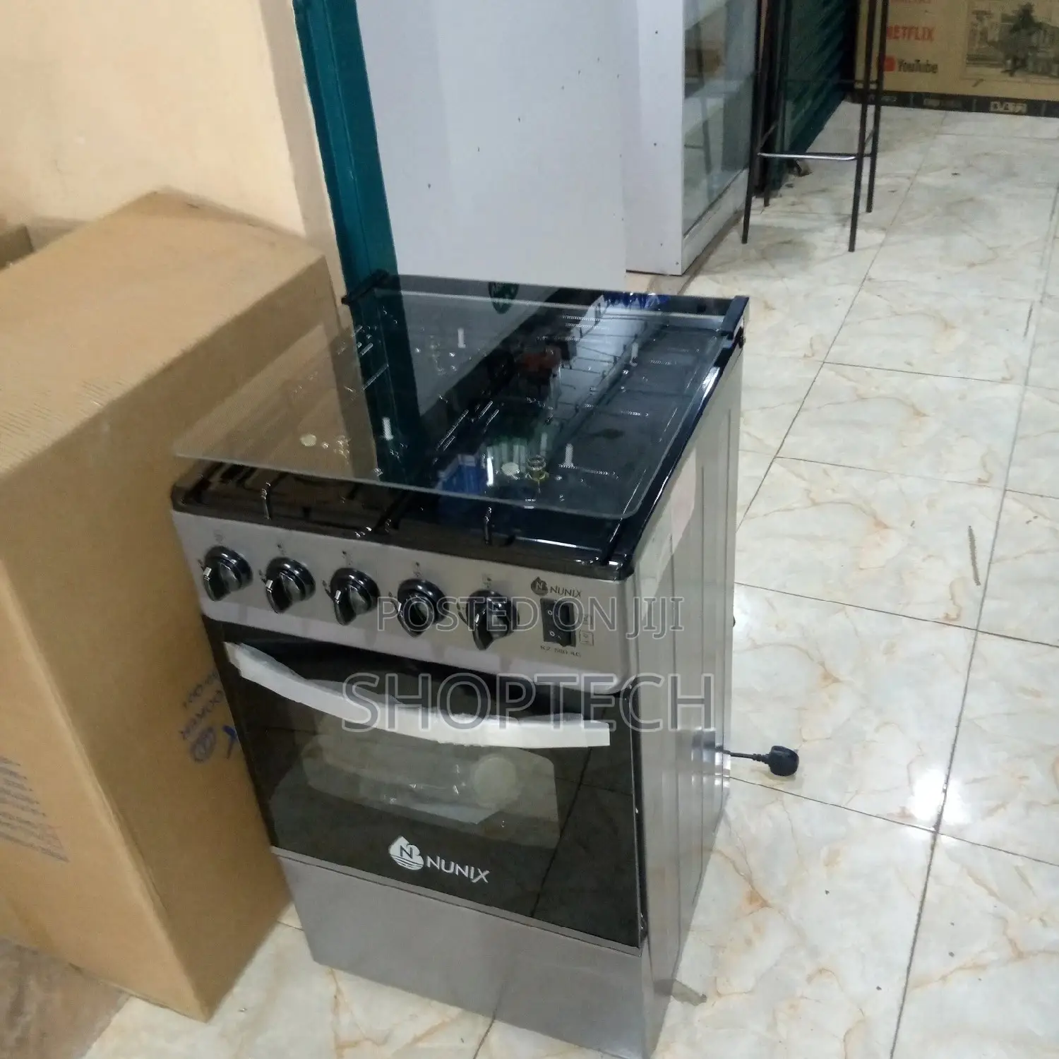 New Nunix Free Standing 4 Gas Oven Cooker