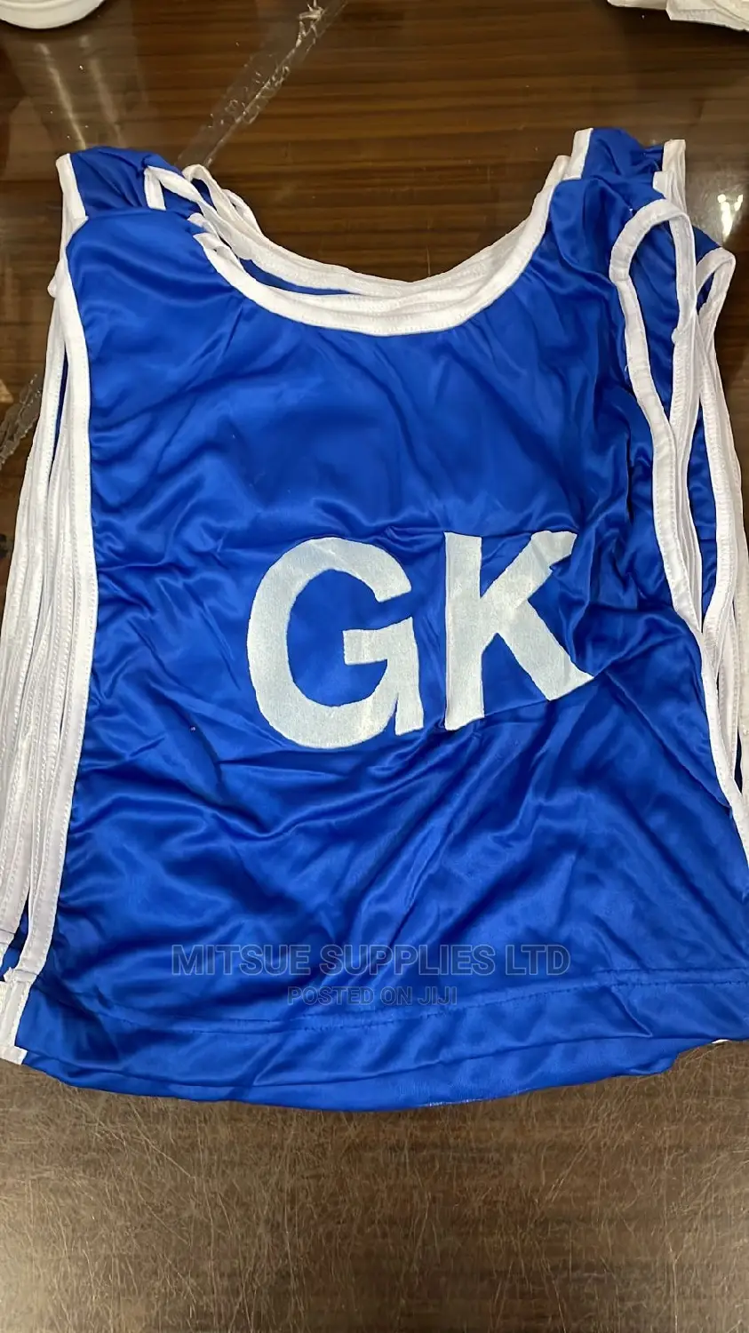 A Set Of 7 Netball Bibs Marked-red Blue