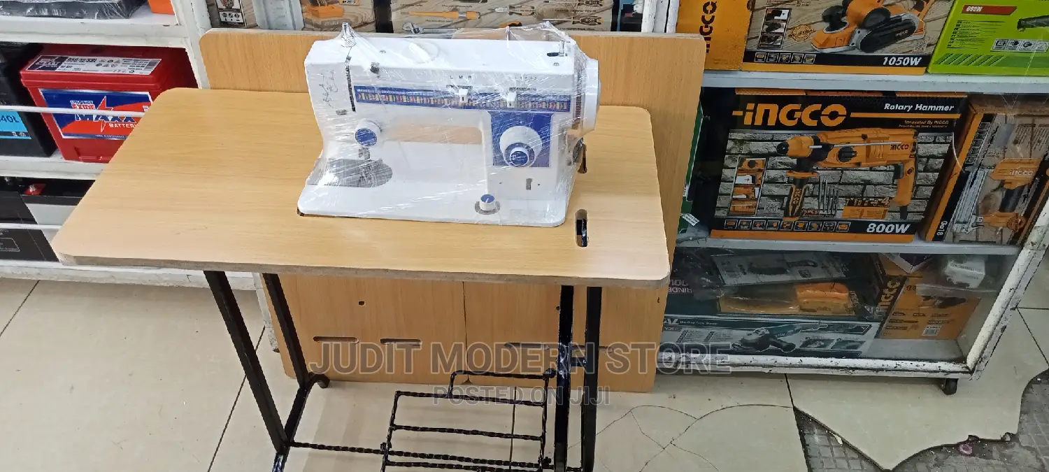 Multi-Purpose Sewing Machine With Table