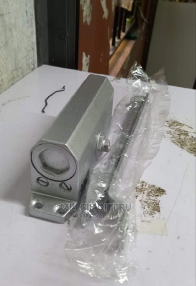 Archive Adjustable Overhead Door Closer Left or Right Hand 4575 KG in