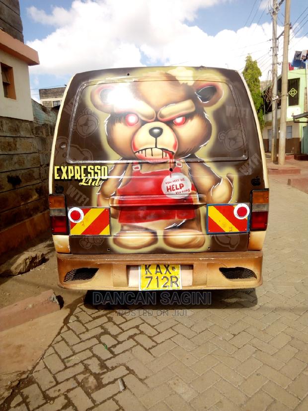 Nissan Caravan (Urvan) 2002 Beige - thumbnail 3