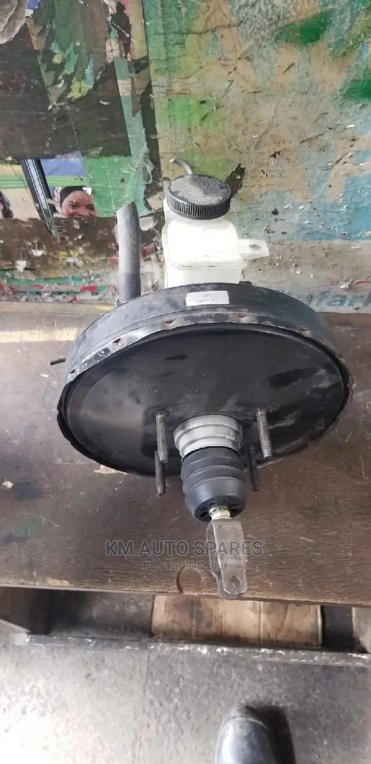 Mazda Familia Brake Booster/Master Cylinder.