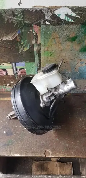 Mazda Familia Brake Booster/Master Cylinder.