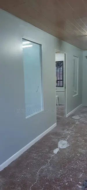 Gypsum With a Section of Glass Partition