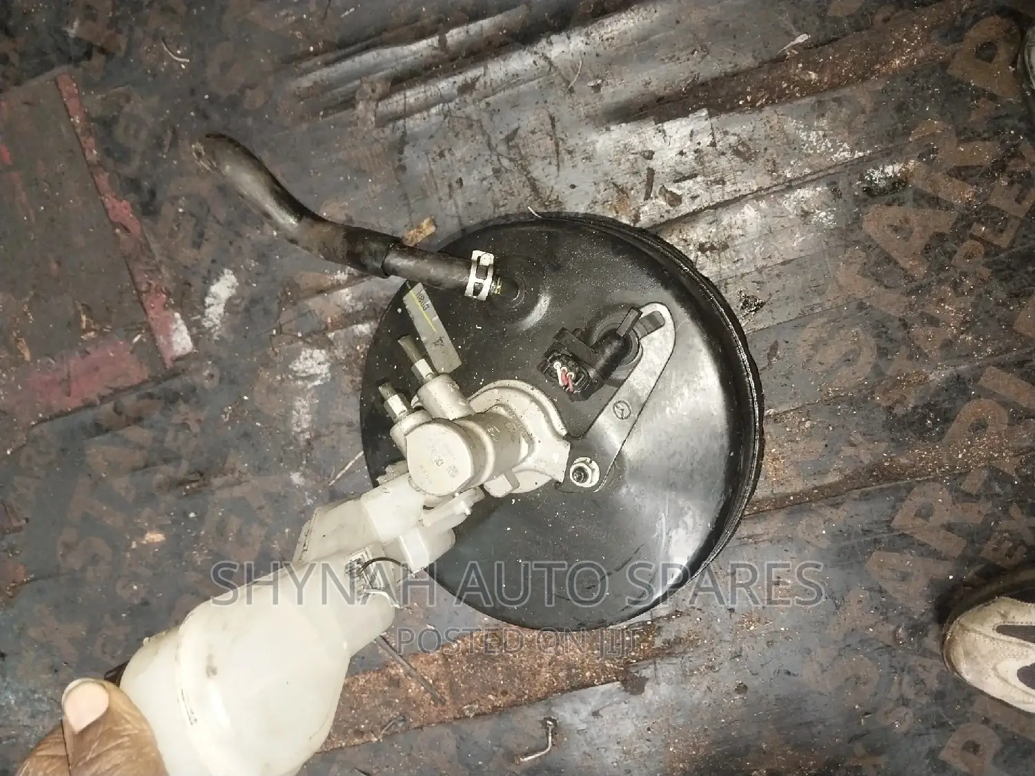 Mazda Demio Booster and Master Cylinder With Switch