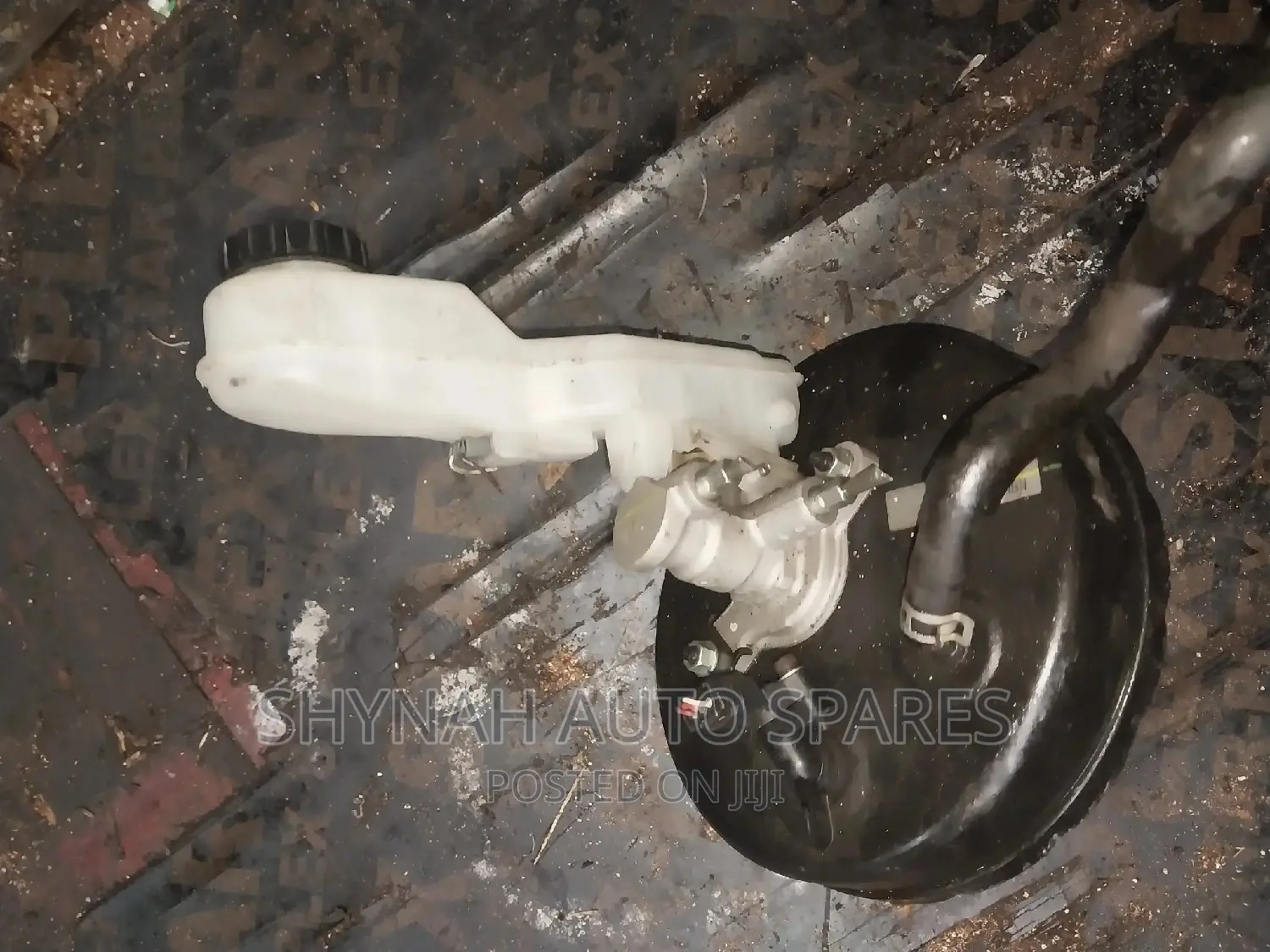 Mazda Demio Booster and Master Cylinder With Switch
