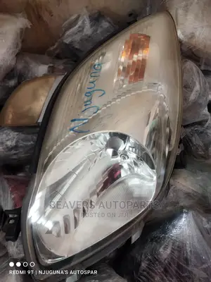 Vitz 2008 Zenon Headlight