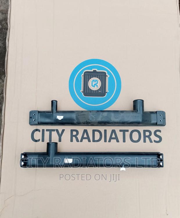 Mitsubishi FH 215 Radiator Covers (Tanks) Replacement.