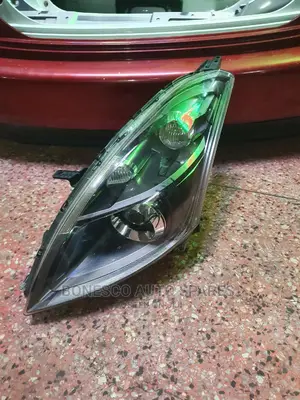 Suzuki Swift RS Smoked Xenon Headlight Assembly