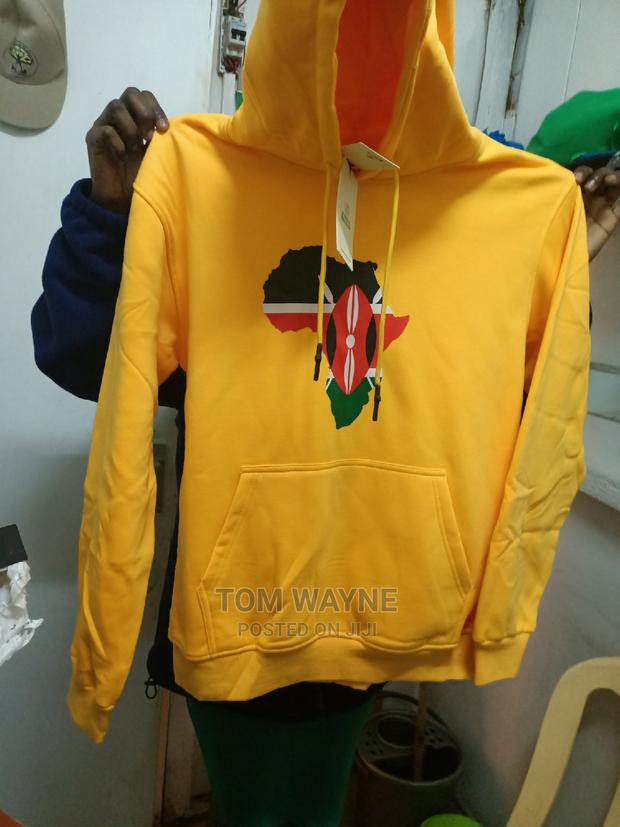 Yellow Hoodies With Kenyan Flag Printed on Them