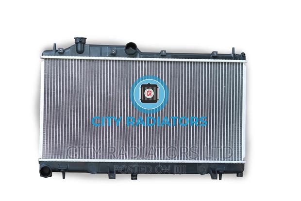 Subaru Forester Brand New Plastic Aluminum Radiator.