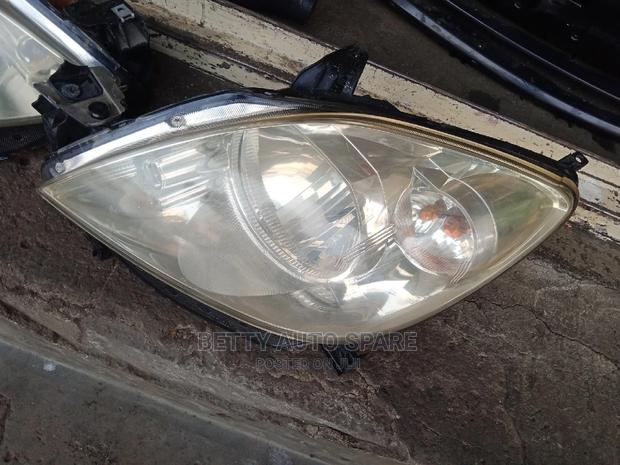 Demio 2005 Headlight - main view