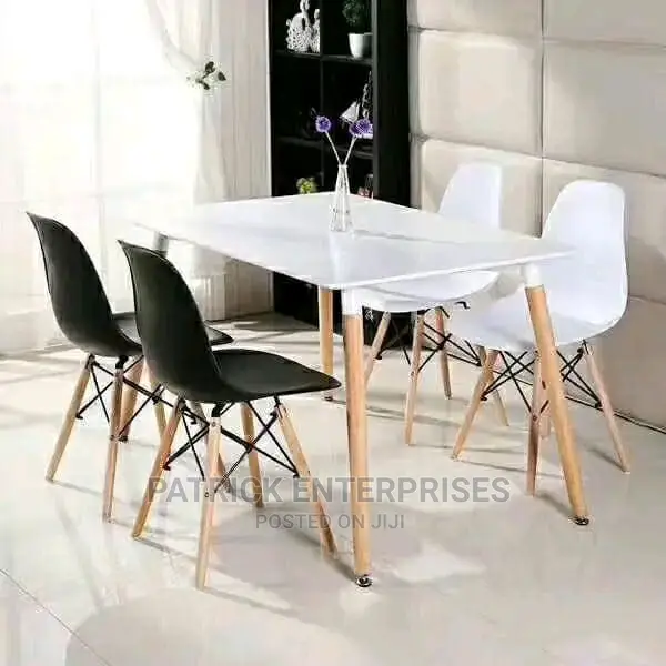 Imported Eames Table Plus Eames Chairs