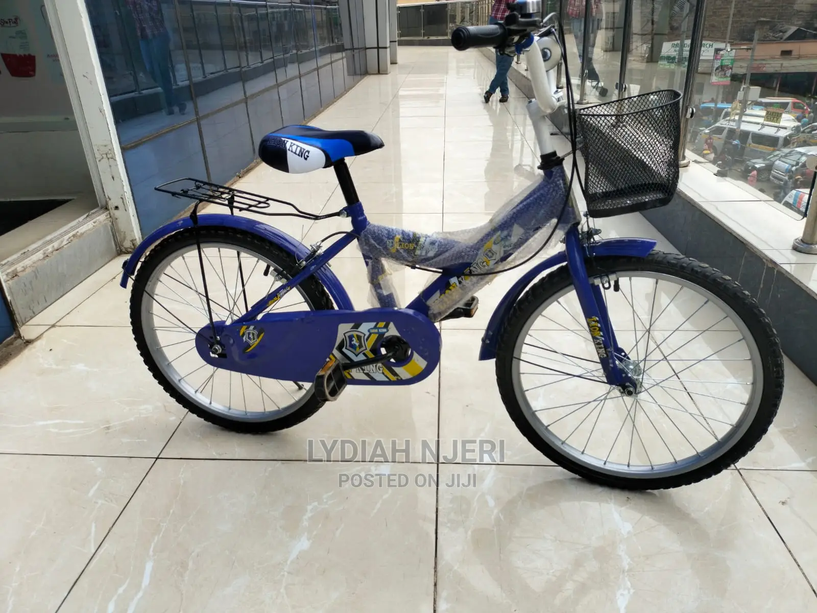 halfords lion king bike