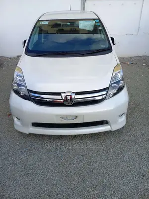 White 2015 Toyota ISIS - Pre-owned Sedan for Everyday Use