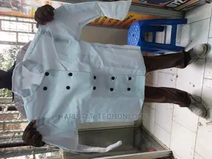 A Set Of Chef Jacket ,Apron,Chef's Hat And Chef's Tie