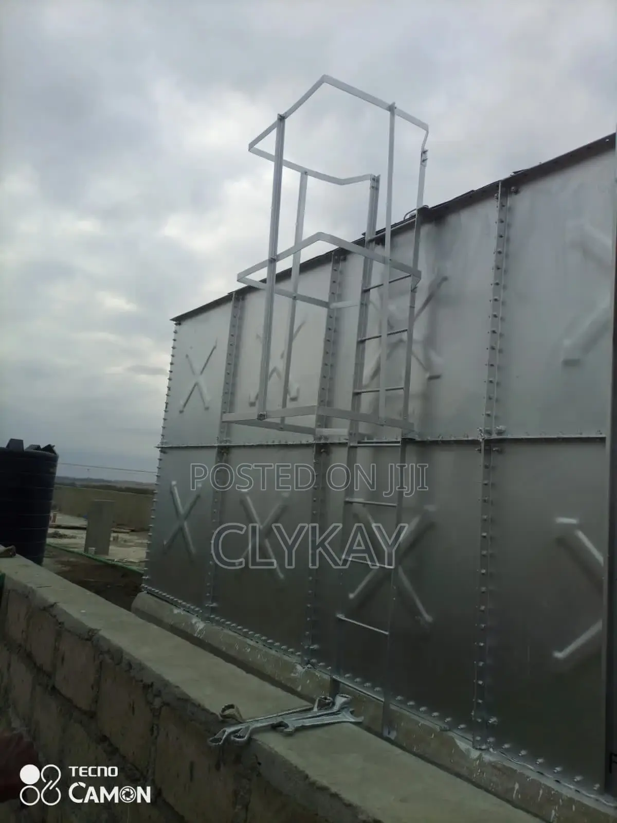 Pressed Panel Tank Mounted on a Dwarf Wall