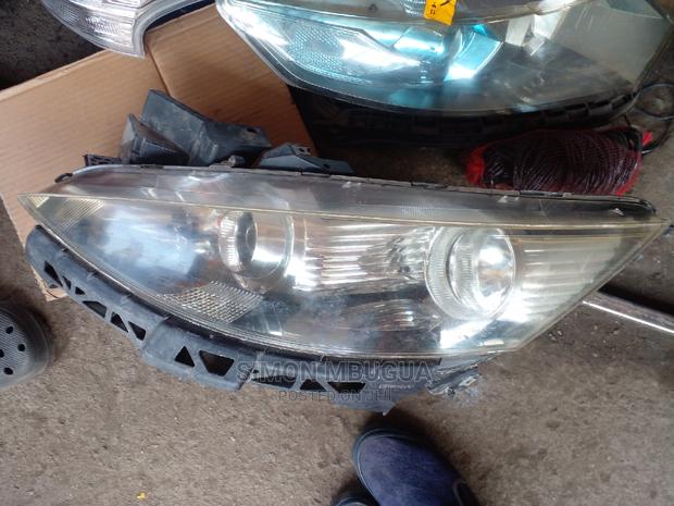 Mazda Biante Headlight