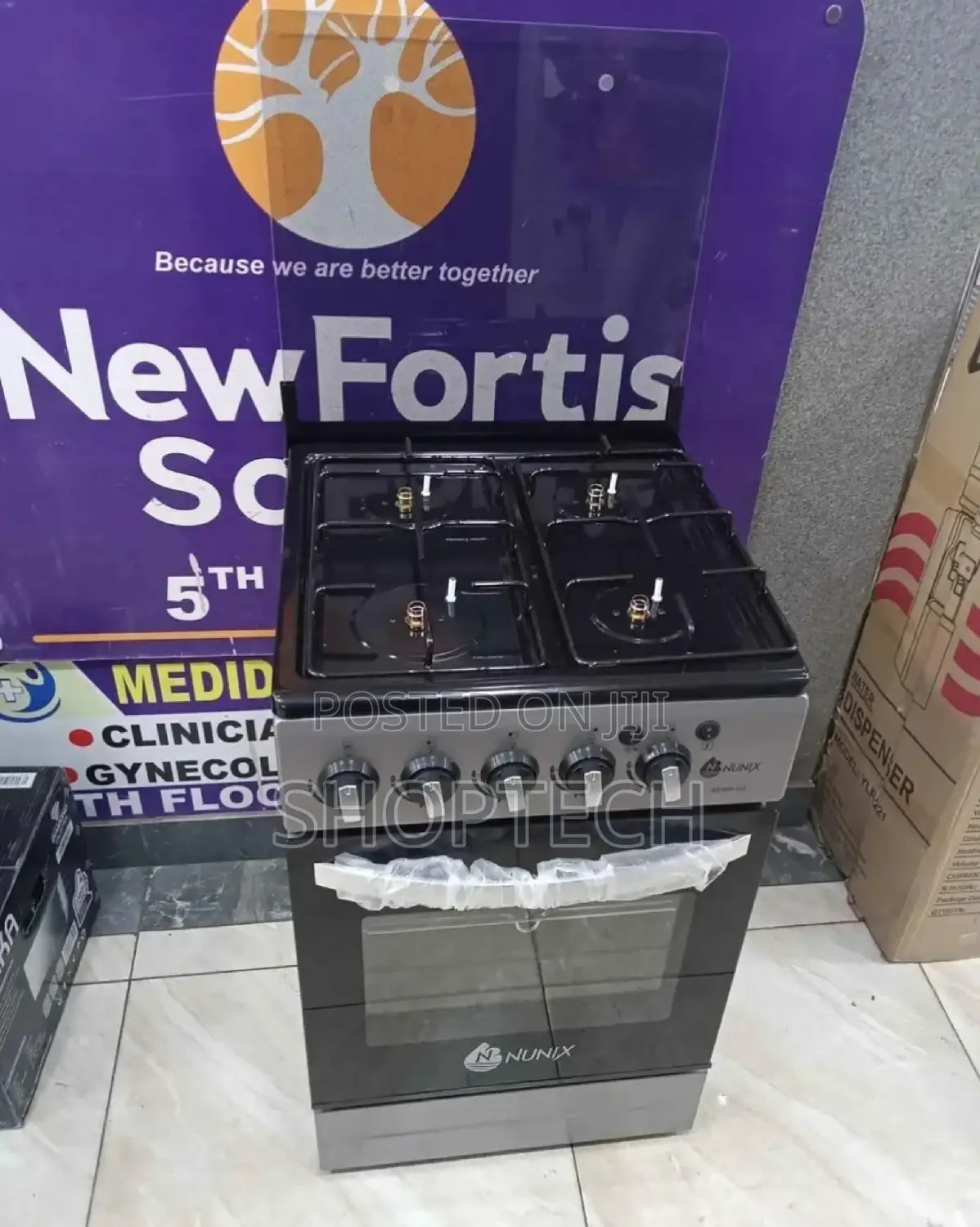 Nunix 4 Gas Standing Cooker+ Oven Cooker.