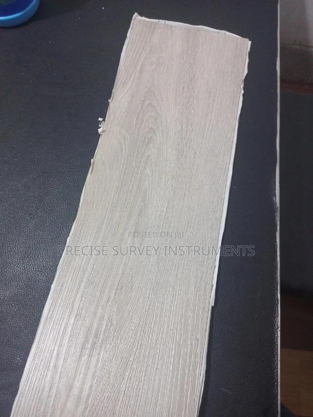 Laminate Floor Tiles (Peel and Stick)