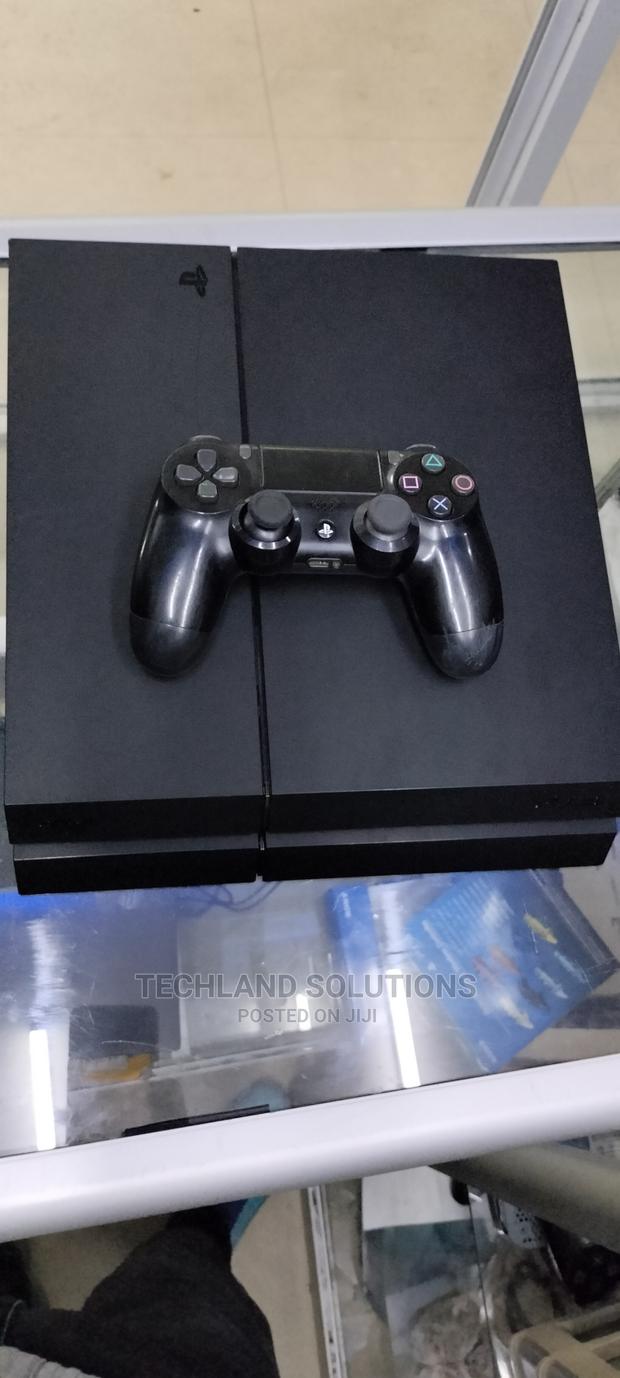 Black SONY Ps4,Playstation 4, 6 Months Old - main view
