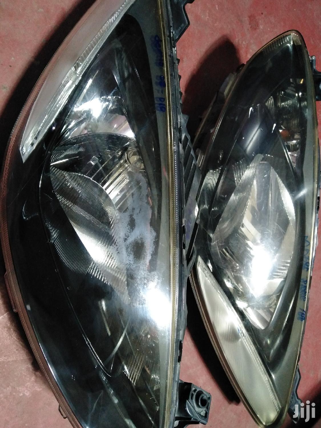 Mazda Demio 2010 Headlights