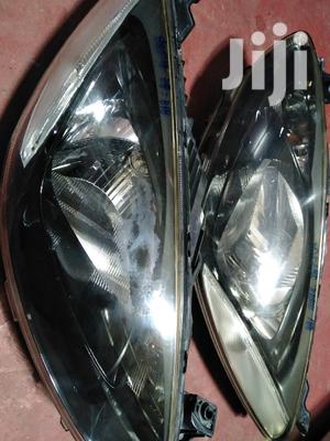 Mazda Demio 2010 Headlights