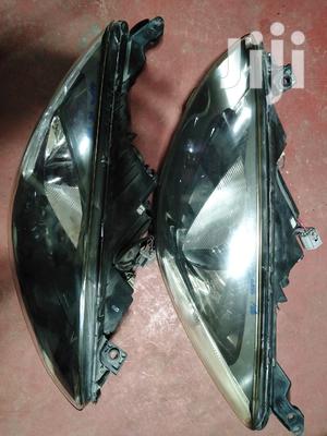 Mazda Demio 2010 Headlights