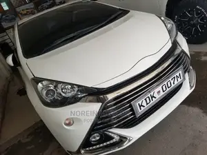 2016 Toyota Aqua White - Compact Hybrid Sedan with Advanced Features