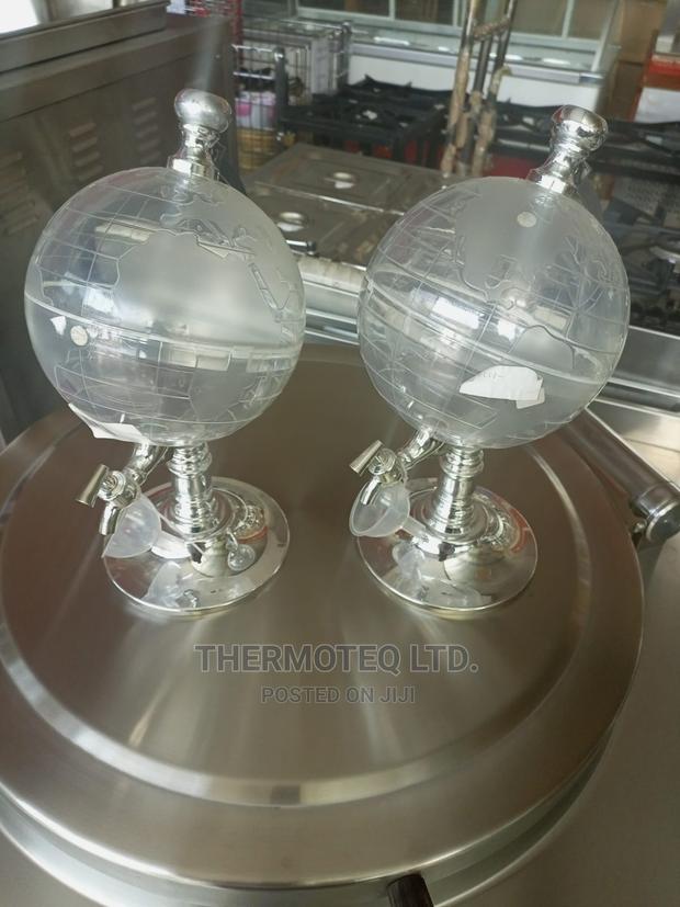 Juice Dispenser. (Globe)