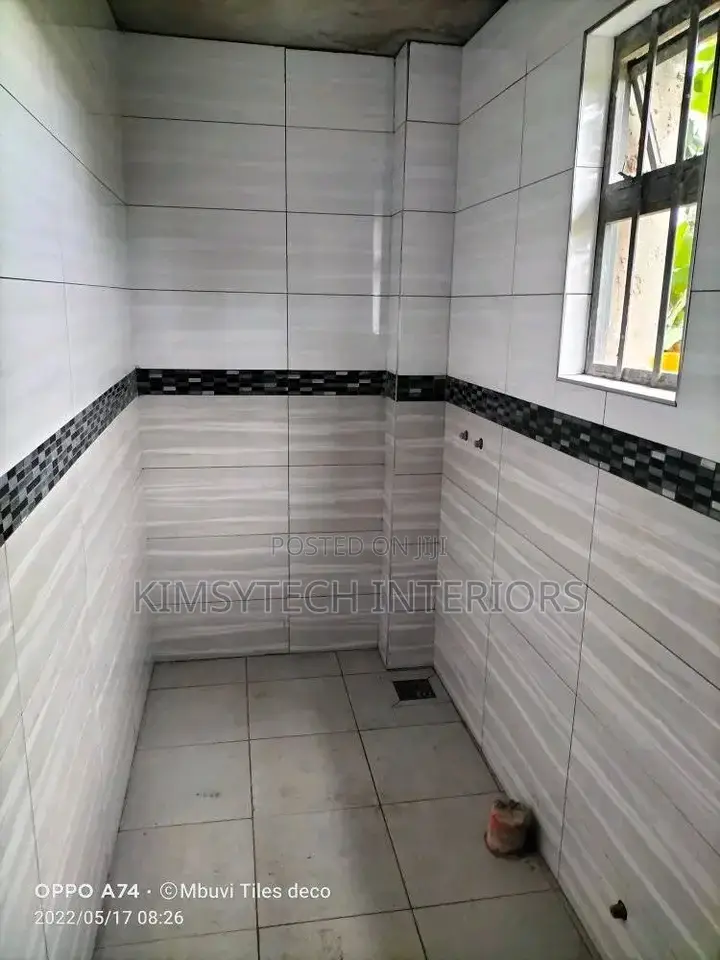Tiles Laying and S.P.C Instalation