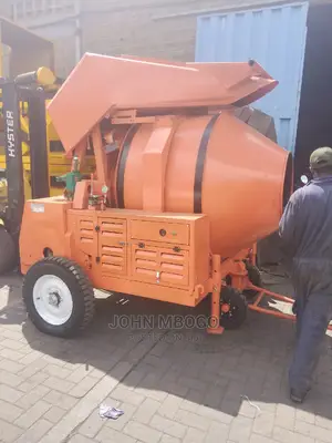 Self Loading Concrete Mixer .