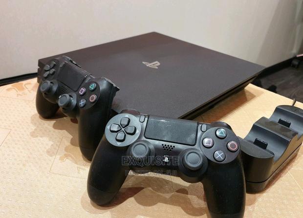Playstation 4 Slim (Slightly Used) - thumbnail 2