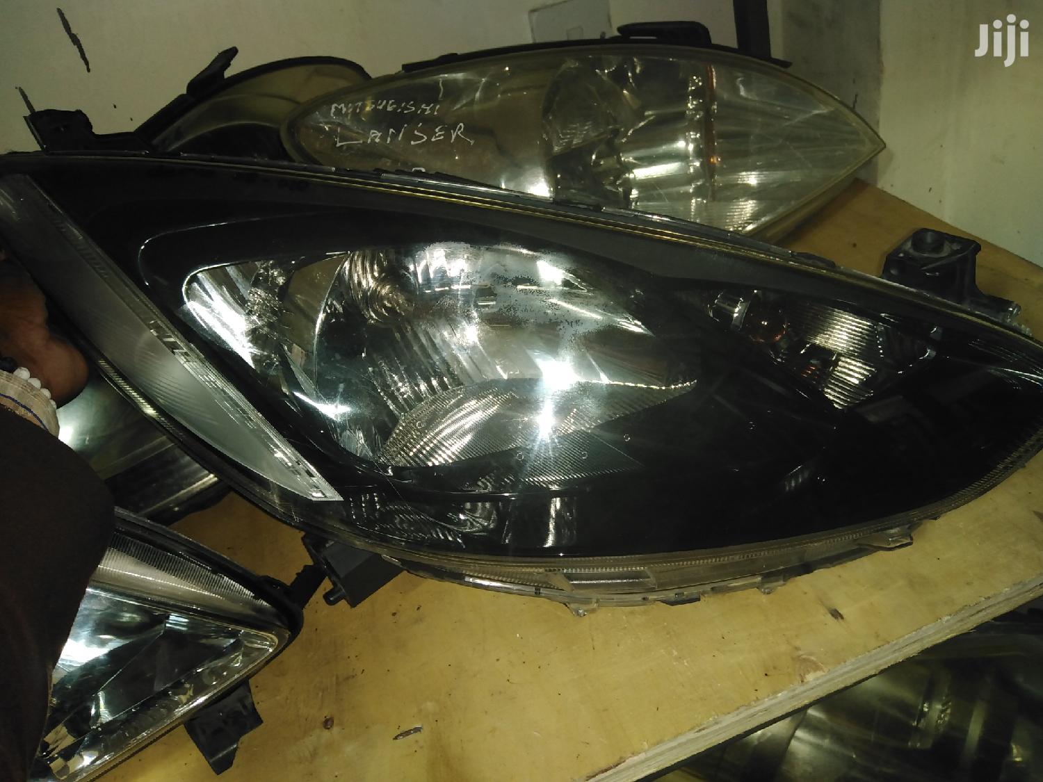 Mazda Demio 2010 Headlights