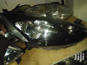 Mazda Demio 2010 Headlights