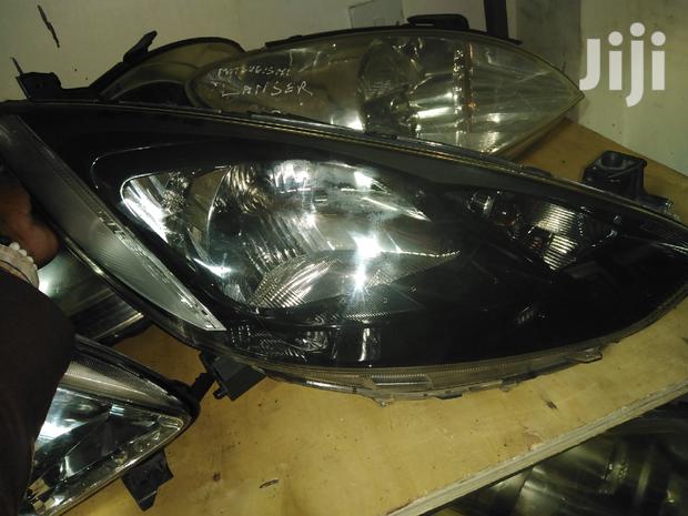 Mazda Demio 2010 Headlights