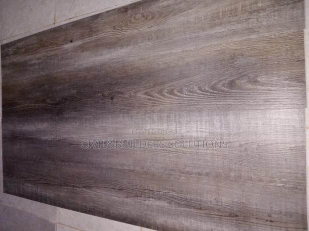 Sticking Laminate Flooring Tiles - main view