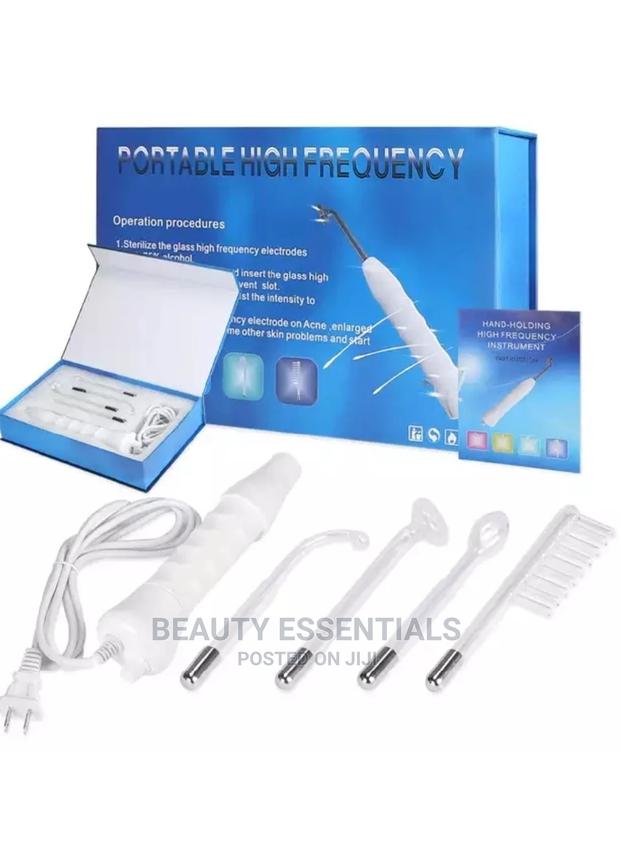 Hand Holding High Frequency Equipment - main view