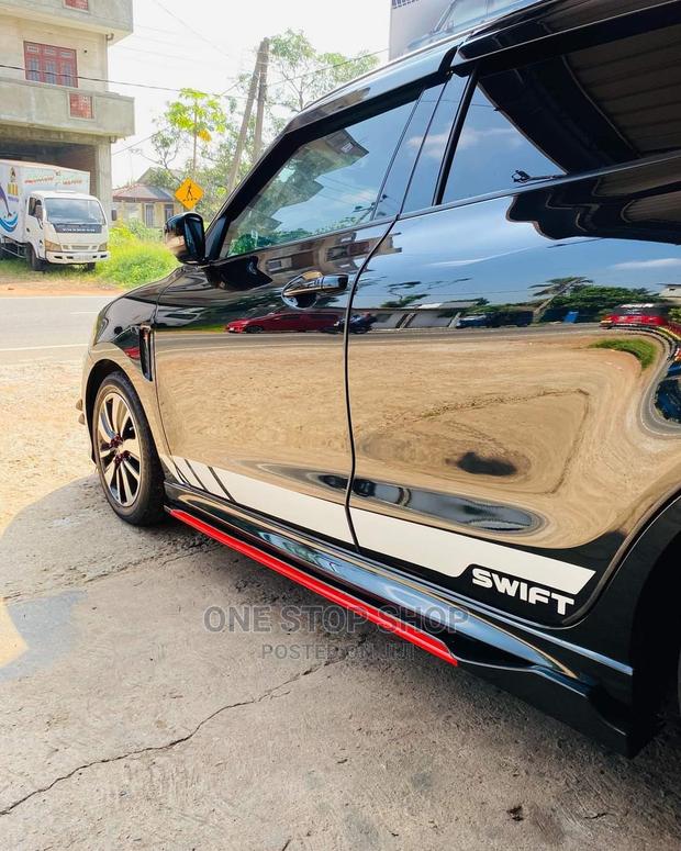 Car Fitted With Black Red Side Skirt