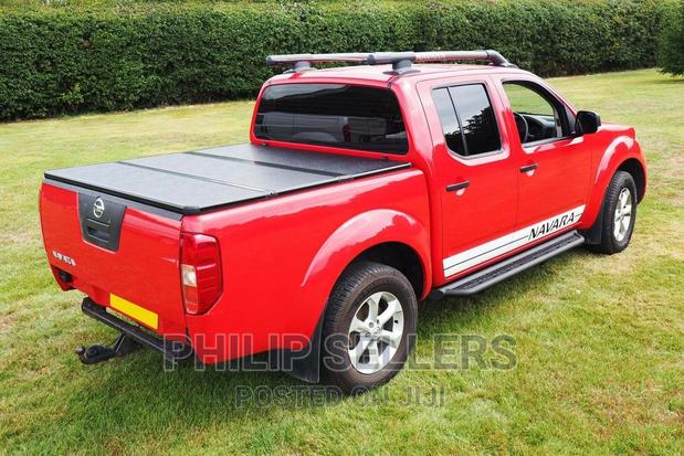 Nissan Navara D40 Double Cab Hard Folding Tonneau Cover - main view