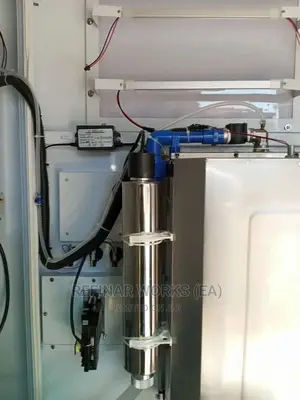 Water Vending Cabinet. Simple Wall Mounted. Accepts Coins.