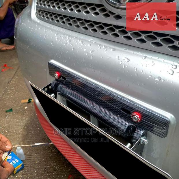 Car Fitted With Front Adjustable Carbon Number Plate Holder