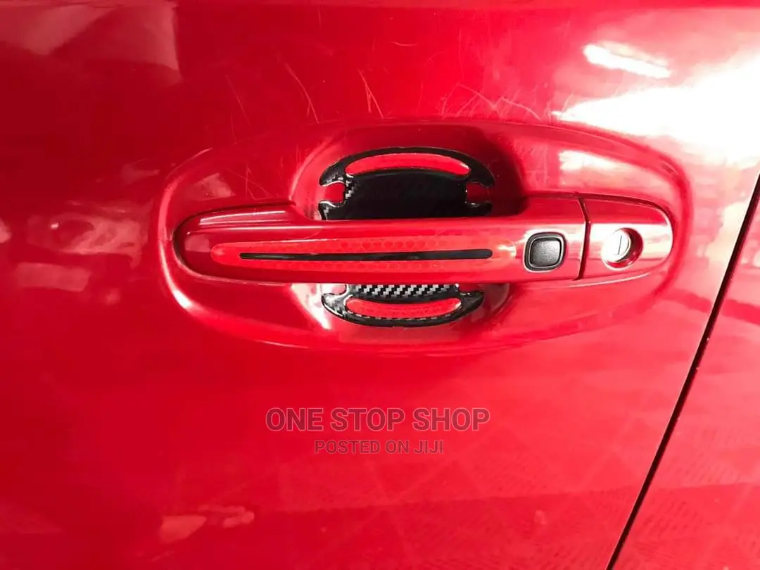 Red Car Fitted With Door Handle Antiscratch Stickers
