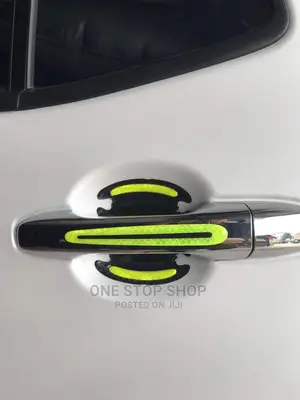 Car Fitted With Luminous Green Reflective Doorhandle Sticker