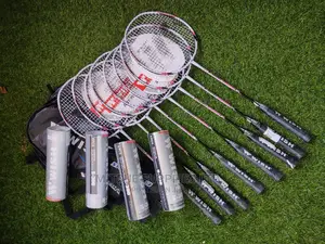 A Set Of 8 Badminton Rackets 24 Shuttlecocks In 4 Tins