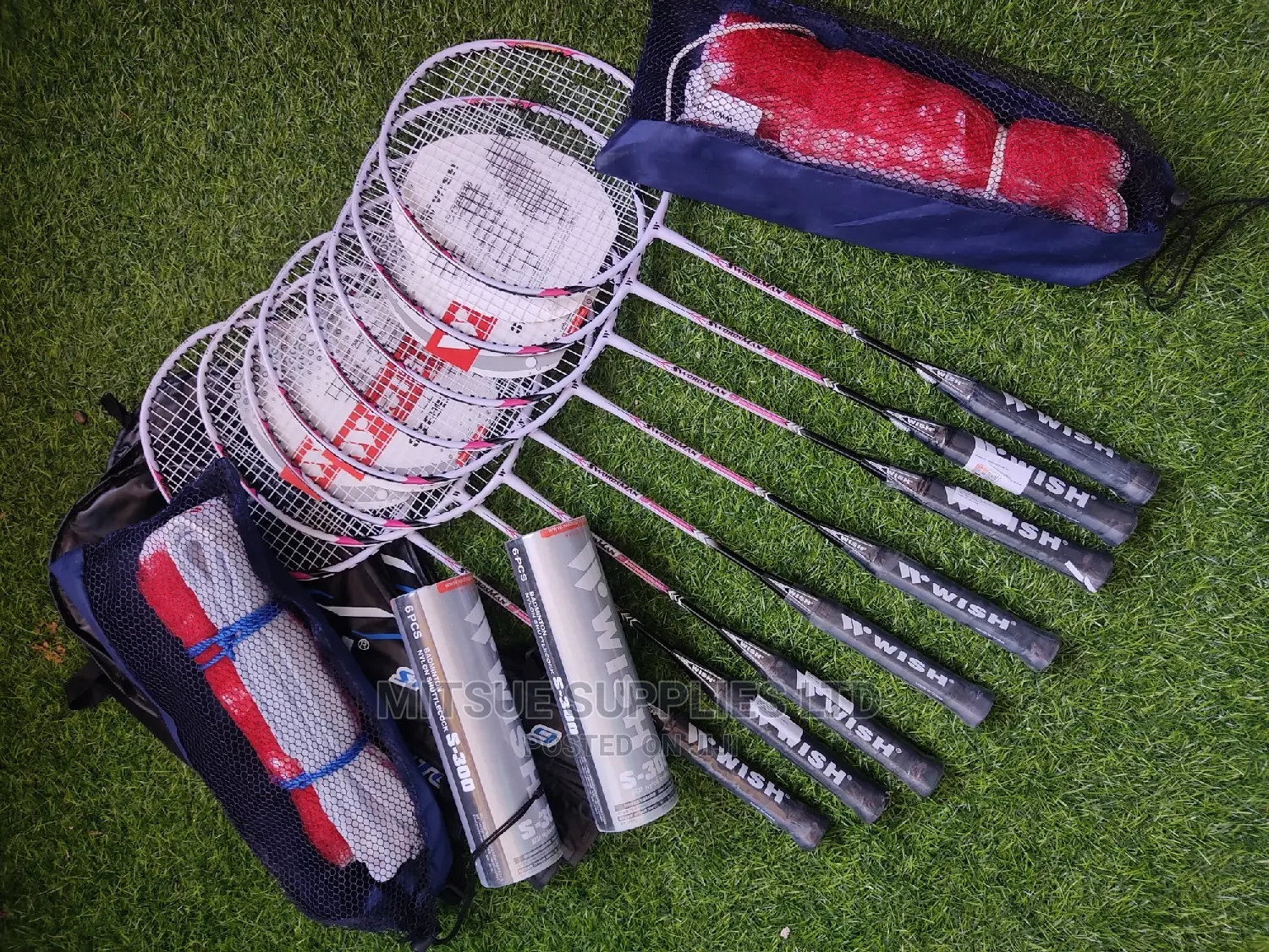 A Set of 6 Badminton Rackets, 2 Nets 12 Shuttlecocks