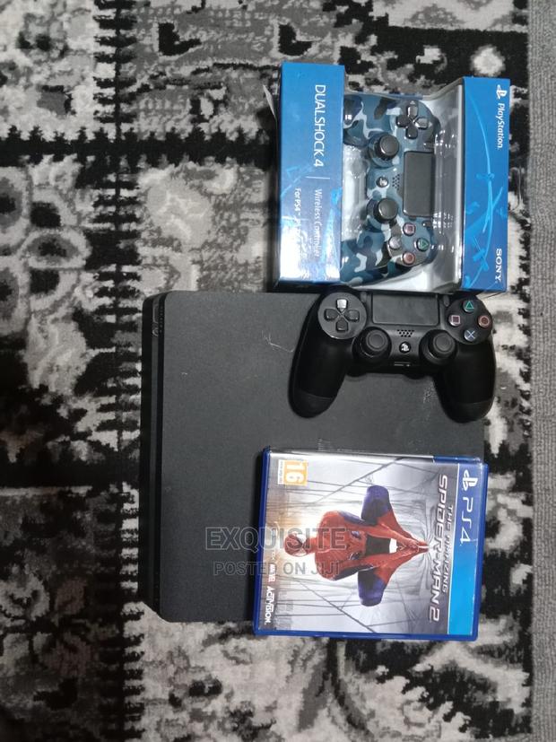 Playstation 4 Slim (With Games) - thumbnail 3