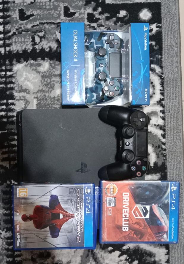 Playstation 4 Slim (With Games) - main view