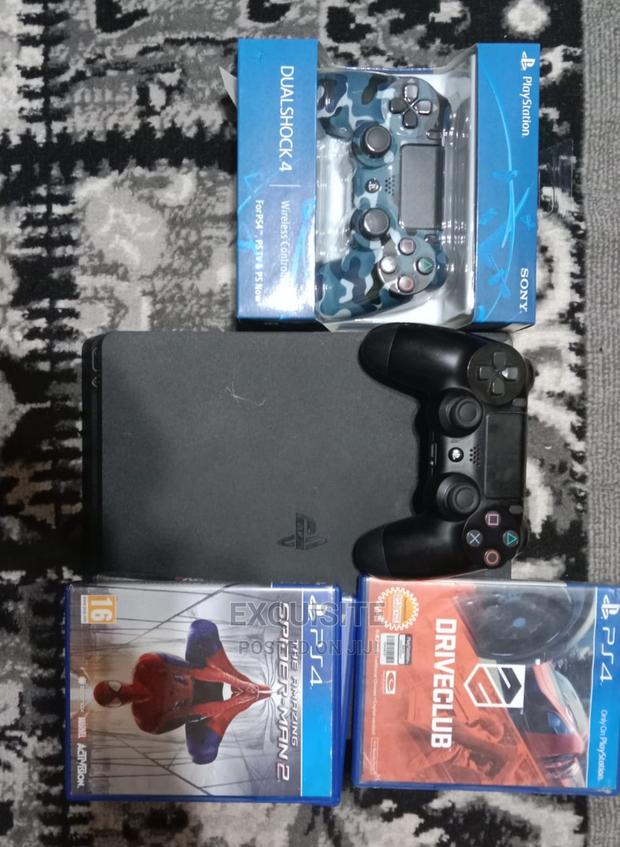 Playstation 4 Slim (With Games) - thumbnail 4